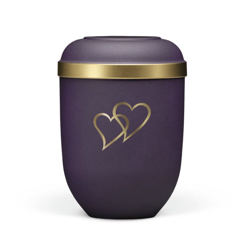 Violette Naturstoffurne mit goldfarbener Randverzierung und zwei goldenen Herzen, in runder Form und Gesamtansicht.