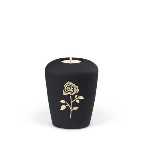 Keramikurne in anthrazit mit samtiger Oberfläche, geformt wie ein Zylinder, verziert mit einer goldenen Rose und einem Teelichthalter oben.