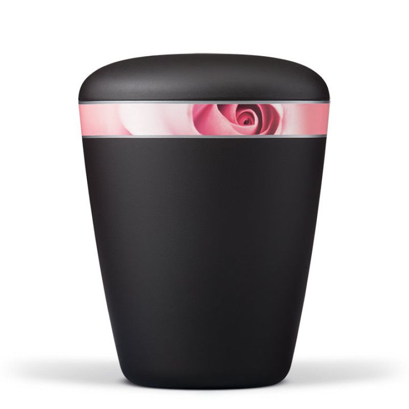 Naturstoffurne in anthrazit Velours mit einem dekorativen Band in Rosa, das eine Rosenblüte zeigt; Gesamtansicht der urnenförmigen Gestaltung.