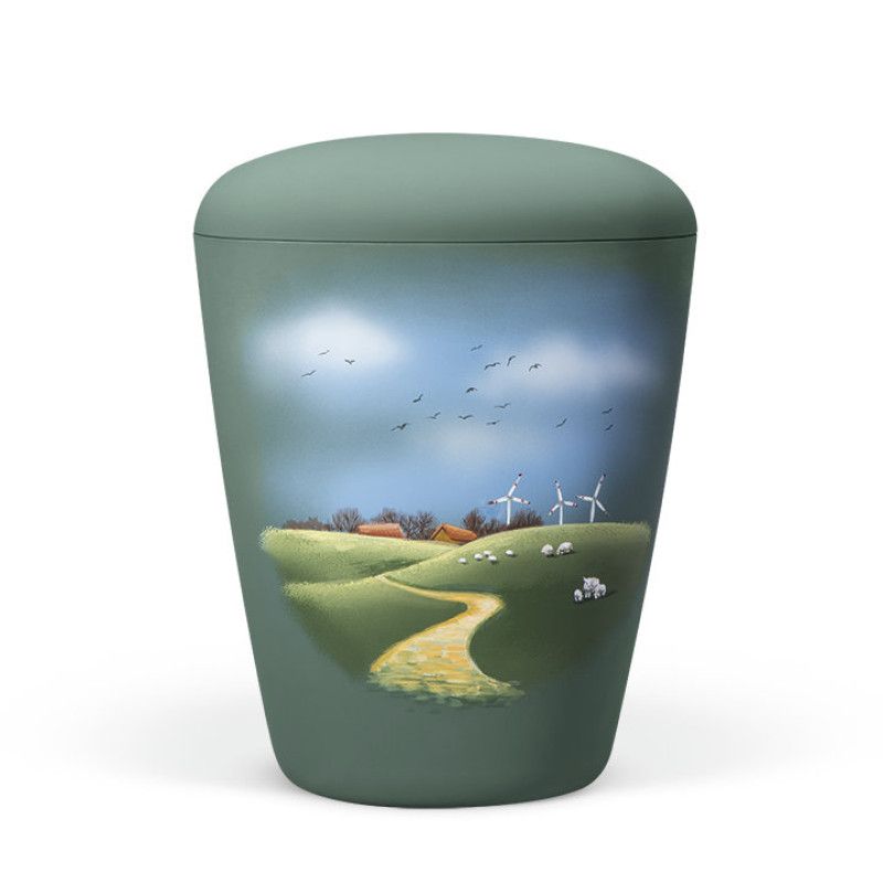 Eine olivgrüne Naturstoffurne mit handbemaltem Motiv einer Wiesenlandschaft, die einen Weg, Schafe und Windräder zeigt, in Gesamtansicht.