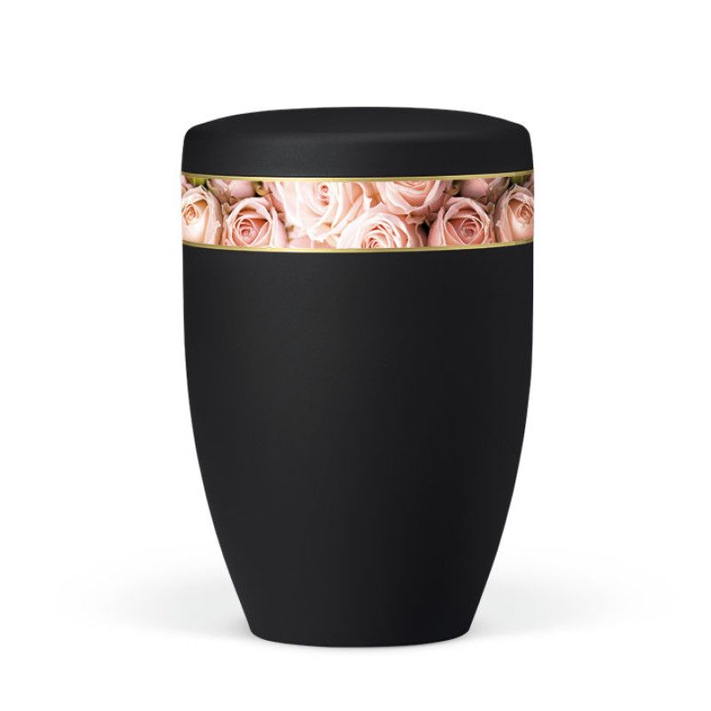 Die Naturstoffurne in Anthrazit Velours hat eine ovale Form und ist mit einem dekorativen Band aus Rosenblättern in Rosa verziert.