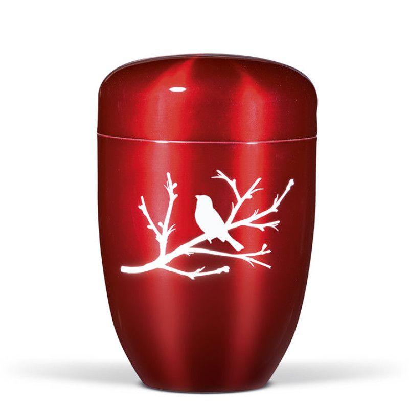 Die weinrote Stahlurne hat eine ovale Form und zeigt ein weißes Airbrush-Motiv eines Vogels auf einem Zweig, sichtbar in Gesamtansicht.