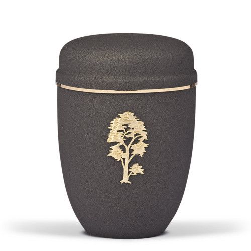 Die Stahlurne in Grau Anthrazit mit Velours-Oberfläche hat eine runde Form, einen goldenen Band und zeigt ein Baum-Motiv in Gold auf der Vorderseite.
