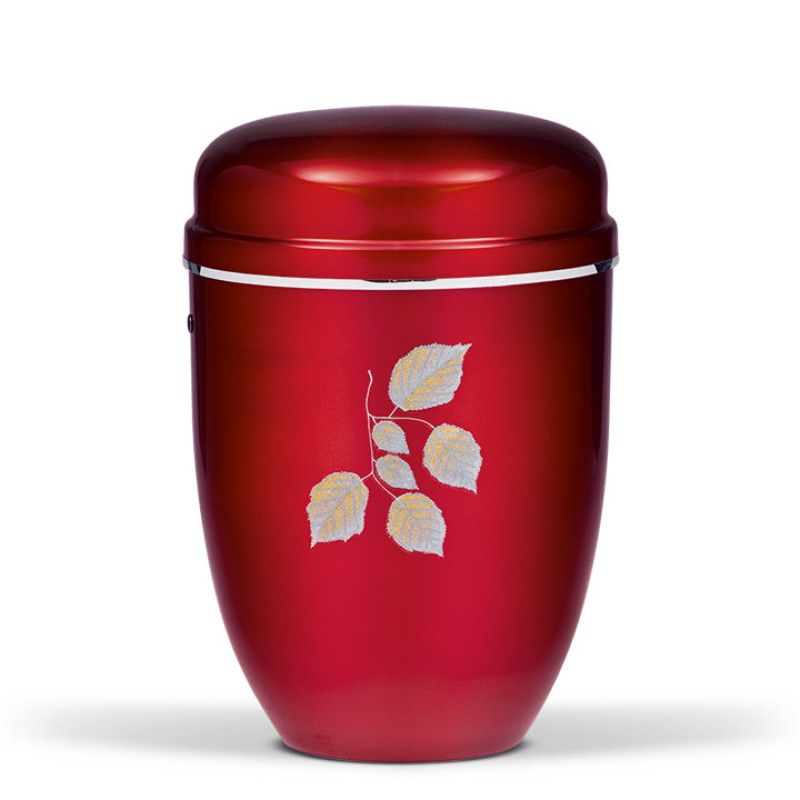 Die weinrote Stahlurne hat eine ovale Form, einen glänzenden Deckel und ist mit einem silbernen Band sowie einem Blattdesign verziert.