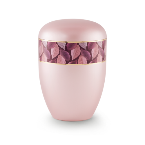 Die Urne der Edition Wave in perlmutt rosé hat eine ovale Form, ist mit einem Feuille-Zierband in Rosatönen und Goldstreifen verziert und bietet eine Gesamtansicht.