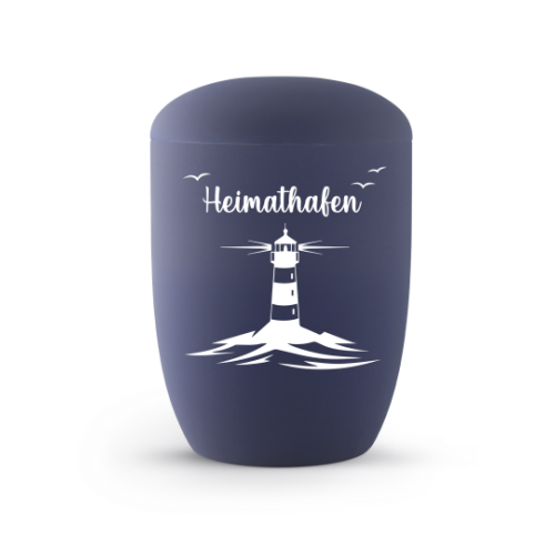 Die urnenförmige Seeurne in Marineblau aus Anhydrit zeigt einen weißen Leuchtturm mit der Aufschrift "Heimathafen" und ist in einer Gesamtansicht abgebildet.