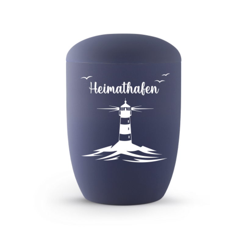 Die urnenförmige Seeurne in Marineblau aus Anhydrit zeigt einen weißen Leuchtturm mit der Aufschrift "Heimathafen" und ist in einer Gesamtansicht abgebildet.