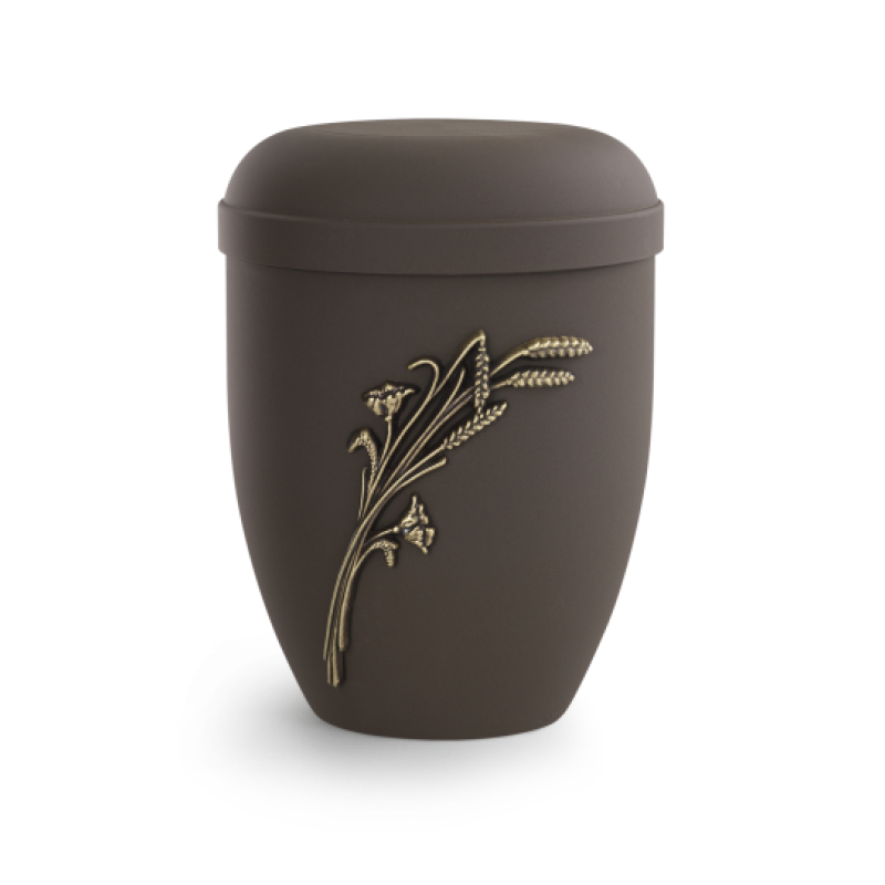 Die Urne aus der Edition Classic in Samtton café hat eine ovale Form, eine matte Oberfläche und ist mit einer goldenen Ährengarbe verziert.