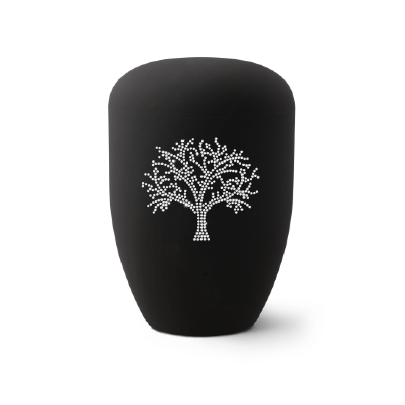 Die Urne aus der Edition Karat ist tiefschwarz, hat eine ovale Form und zeigt einen Baum aus Kristallen als dekoratives Element.