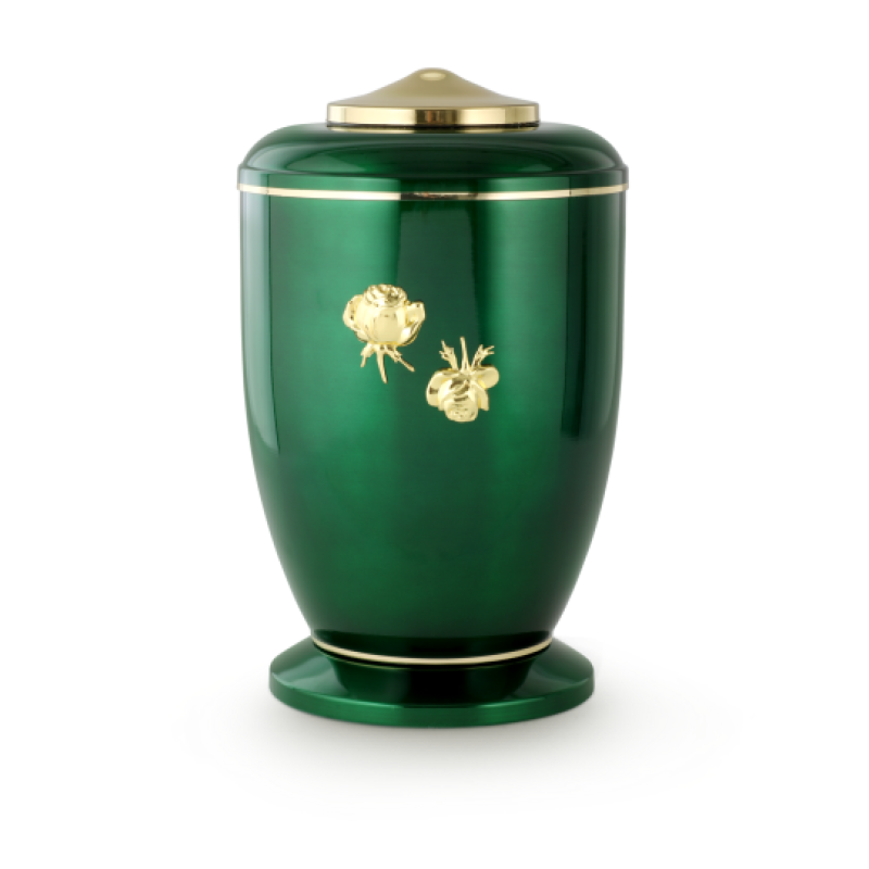 Die grün glänzende Urne aus Stahl hat eine polierte Oberfläche, goldene Verzierungen in Form von Röschen und eine runde, geschwungene Form mit einem Deckel.