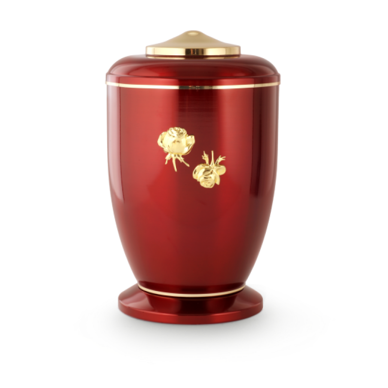 Die Urne ist aus poliertem Stahl in glänzendem Rot, hat eine ovale Form, goldene Röschen-Dekoration und einen goldenen Deckel.