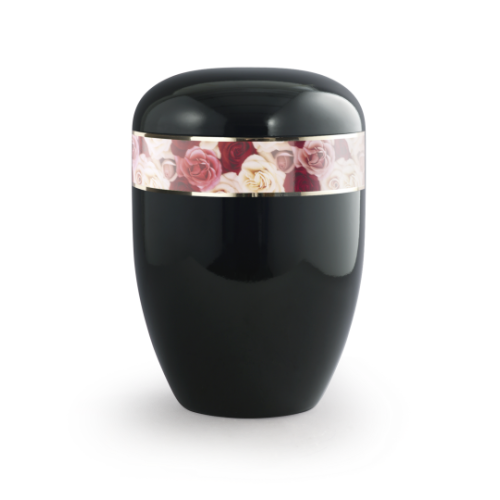 Die Urne aus der Edition 360° hat eine ovale Form, ist in glänzendem Klavierlack schwarz gehalten und besitzt einen dekorativen Rand mit Rosenmotiven.