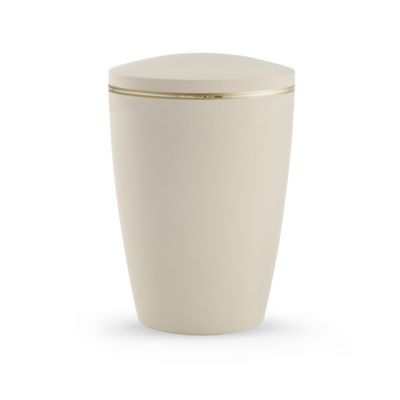 Die Urne der Edition Melina in Samtton Creme hat eine ovale Form, einen matt-glänzenden Goldrand und besteht aus biologisch abbaubarem Material.