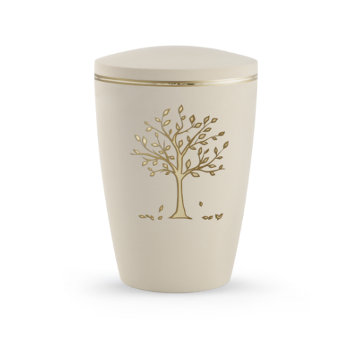 Urne in Samtton Creme mit goldfarbener Baum-Motivprägung und matt/glänzendem Goldband, in konischer Form und mit abgerundetem Deckel.