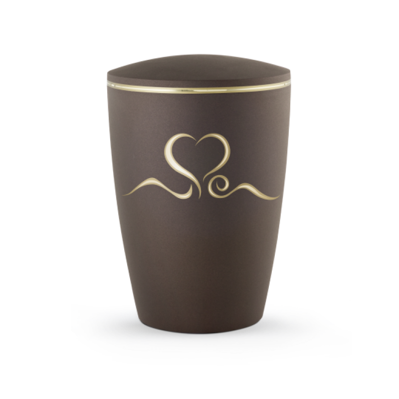 Die Urne in Samtton Cafe hat eine ovale Form, ist aus biologisch abbaubarem Material gefertigt und zeigt ein mattes Herzmotiv mit glänzendem Goldband.