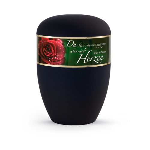 Die Urne aus der Edition Poesie ist tiefschwarz, hat eine runde Form und zeigt ein dekoratives Etikett mit einer roten Rose und dem Text „Du bist von uns gegangen…“.