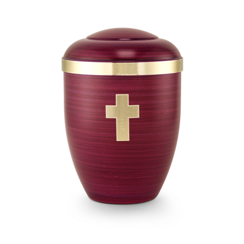 Die handbemalte Urne in florentinerot hat eine ovale Form, einen goldenen Rand und ein gebürstetes Kreuz auf der Vorderseite.