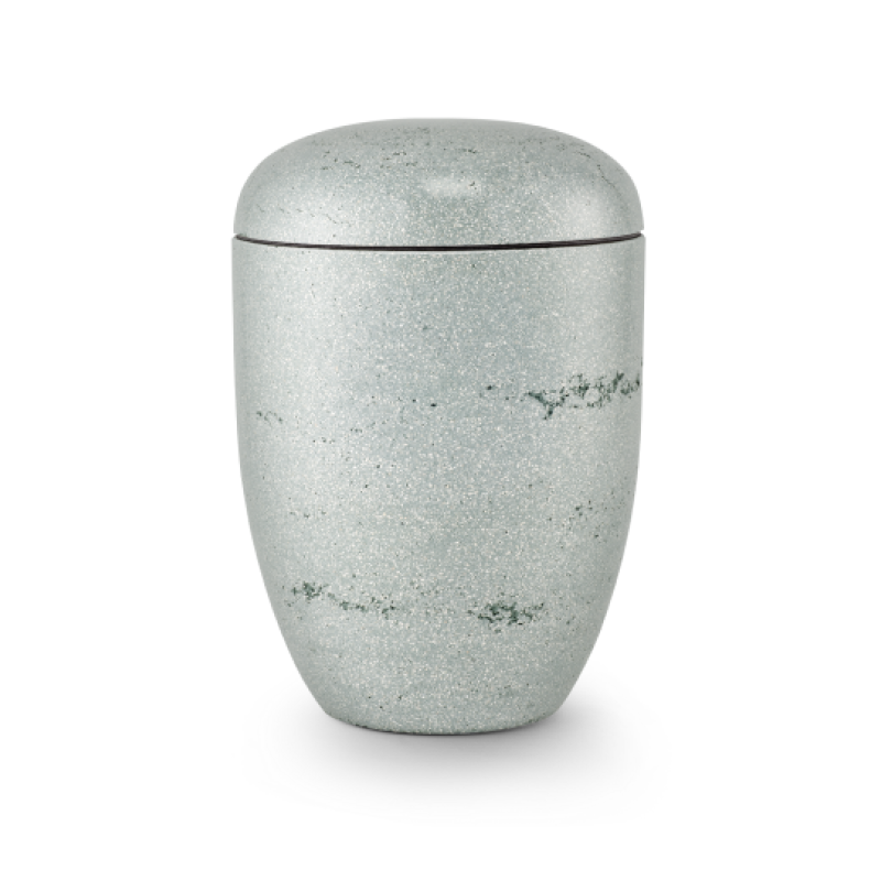 Die Terra-Jura Urne Edition Rocka ist grün, hat eine geschliffene Steinoptik und eine ovale Form mit einem passenden Deckel, sichtbar in Gesamtansicht.
