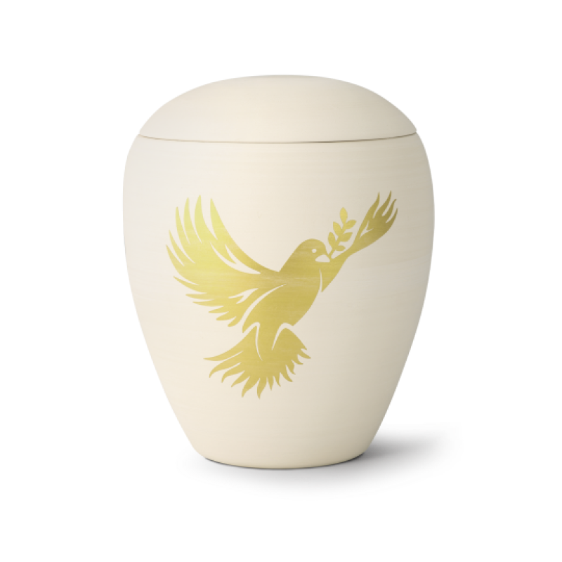 Die cremefarbene Keramikurne hat eine ovale Form und ist mit einer handbemalten, goldenen Taube verziert, die einen Olivenzweig hält.