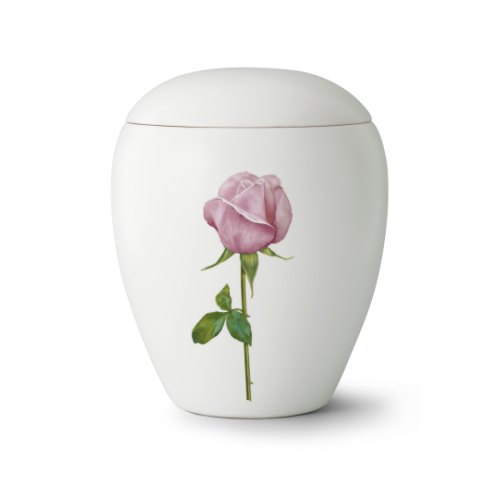 Die weiße Keramikurne der Edition Bianco zeigt eine zarte, pinkfarbene Rose mit grünen Blättern und hat eine runde Form mit einem passenden Deckel.