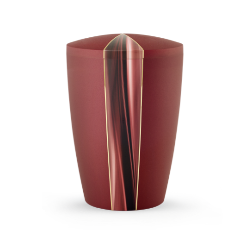 Die Urne in Samtton rubin hat eine ovale Form mit einem Cascade Motiv in glänzendem Schwarz und Gold, und ist biologisch abbaubar.