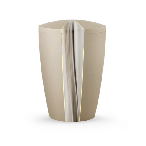 Die Urne der Edition Cascade in Samtton champagner hat eine ovale Form mit einem Cascade-Motiv und einer biol. abbaubaren Oberfläche.