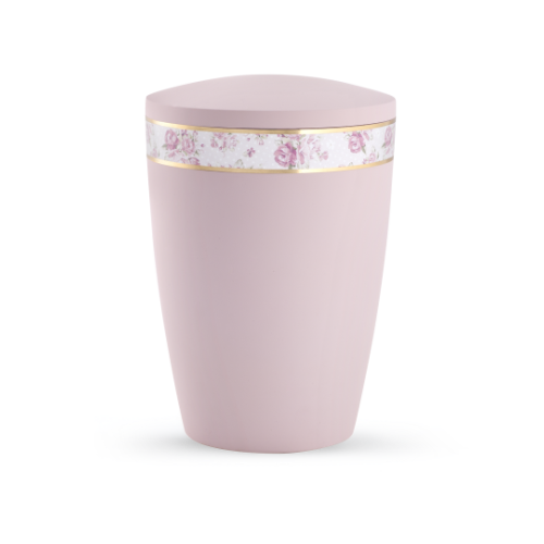 Die rosa Urne aus der Edition Pastell hat eine Soft-Touch-Oberfläche und ist mit einem umlaufenden Rosenband sowie einem goldenen Rand verziert.