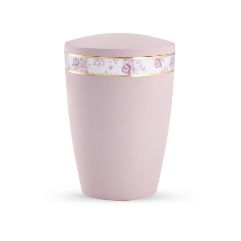 Die rosa Urne aus der Edition Pastell hat eine Soft-Touch-Oberfläche und ist mit einem umlaufenden Rosenband sowie einem goldenen Rand verziert.