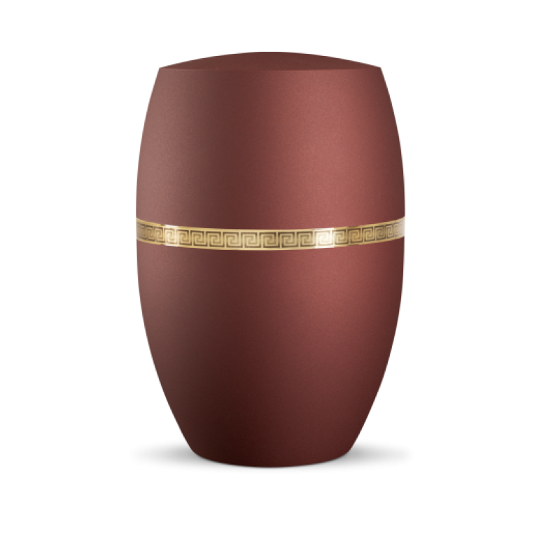 Die Urne Infinity Livorno in Rubinrot hat eine ovale Form, eine samtige Oberfläche und ist mit einem gebürsteten Golddekor im Mäanderdesign verziert.