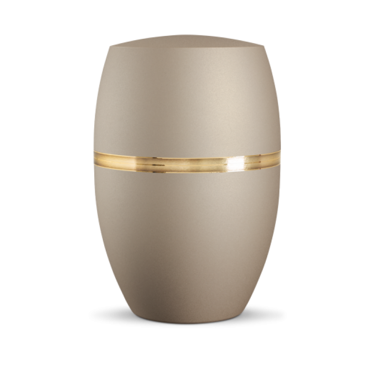 Die Urne Infinity Ouro ist in velvet Champagner gehalten, hat eine ovale Form und ist mit einem gebürsteten Golddekor in der Mitte verziert.