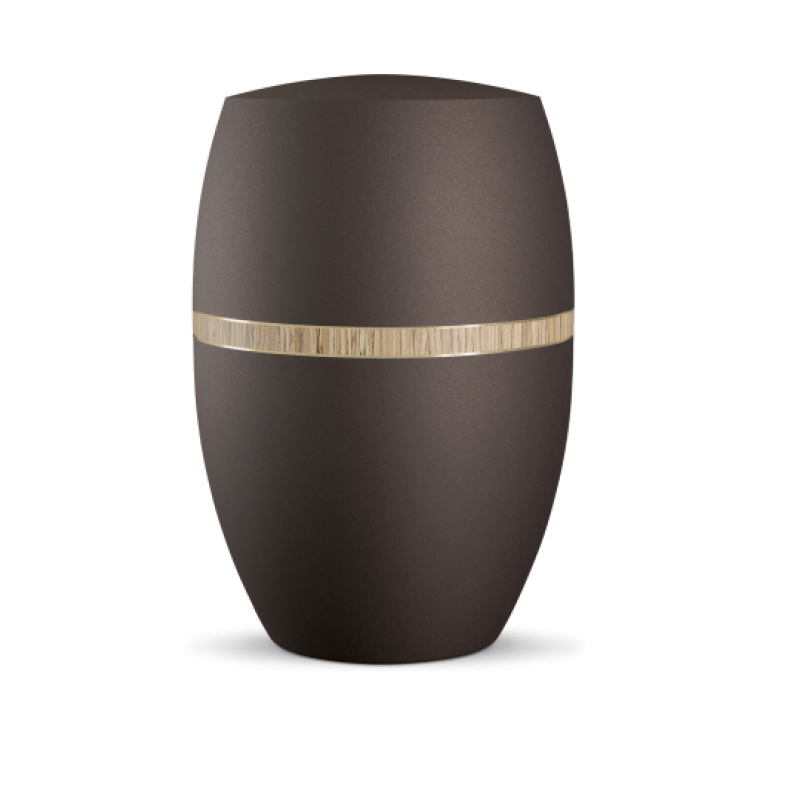 Die Urne Infinity Foresta in der Farbe velvet Siena hat eine ovale Form und ist mit einem dekorativen Bambusstreifen verziert.