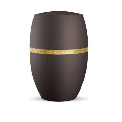 Die Urne in der Farbe velvet Siena hat eine ovale Form und ist mit einem glitzernden goldenen Dekorstreifen verziert.