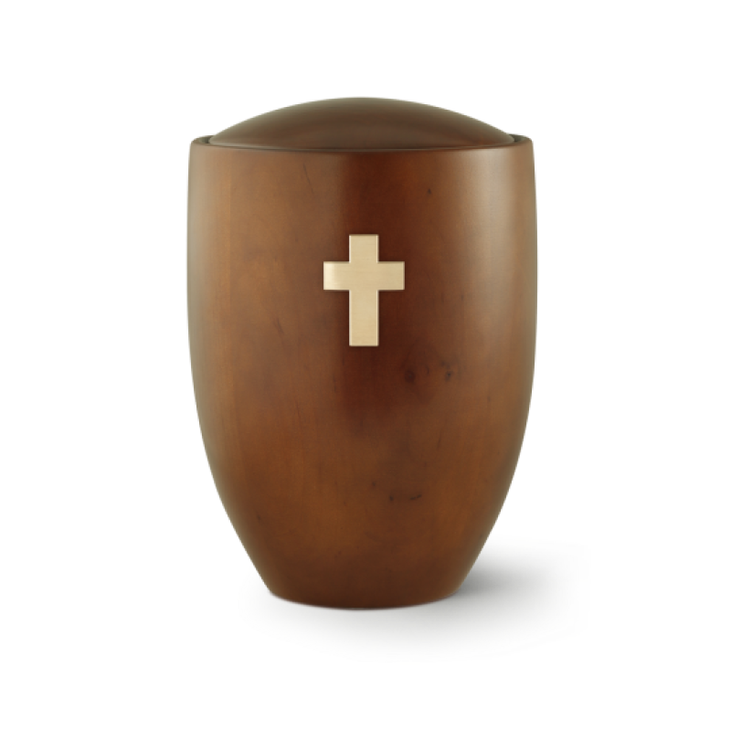 Die Urne aus der Edition Sevilla besteht aus Erle und Teakholz, hat eine ovale Form und ist mit einem gebürsteten Messingkreuz in der Mitte verziert.
