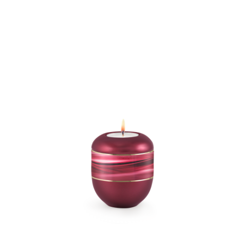 Gedenklicht in perlmutt weinrot mit Wellenmotiv und Goldstreifen, runde Form, Gesamtansicht, flamme brennt oben.