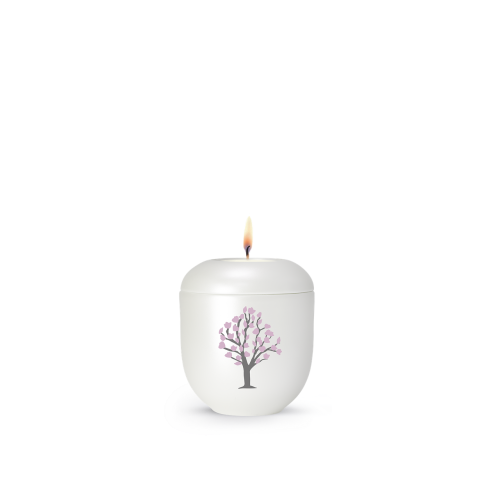 Gedenklicht in perlmuttfarbener Ausführung mit einem Kirschblütenbaum-Motiv, runde Form und brennende Flamme auf der Oberseite.