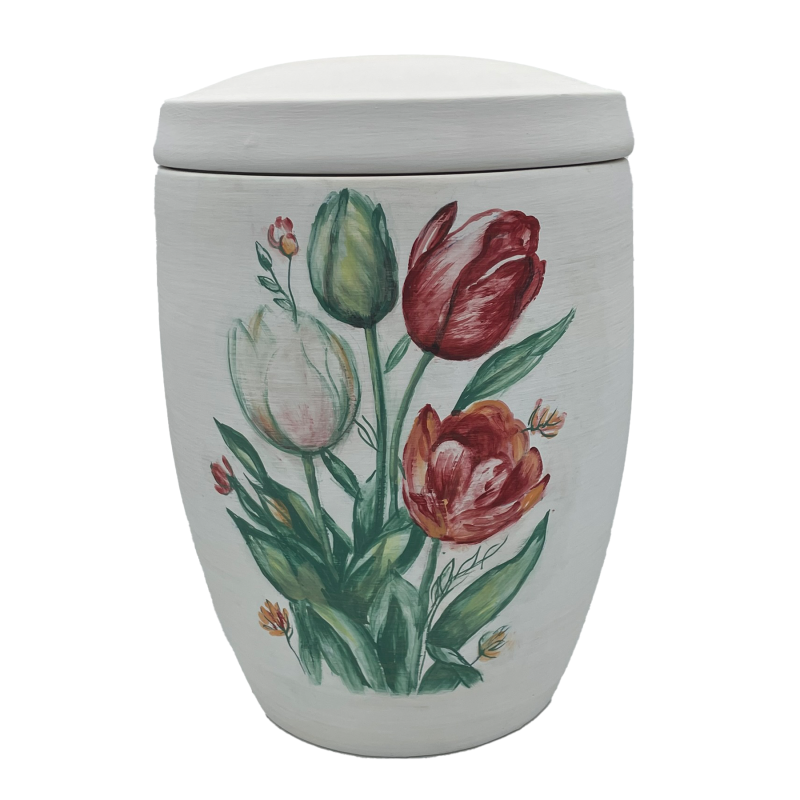 Die Alto Urne ist oval, in Weiß gehalten und zeigt eine farbenfrohe Tulpenmotivik in Rot, Pink und Grün auf der Vorderseite.
