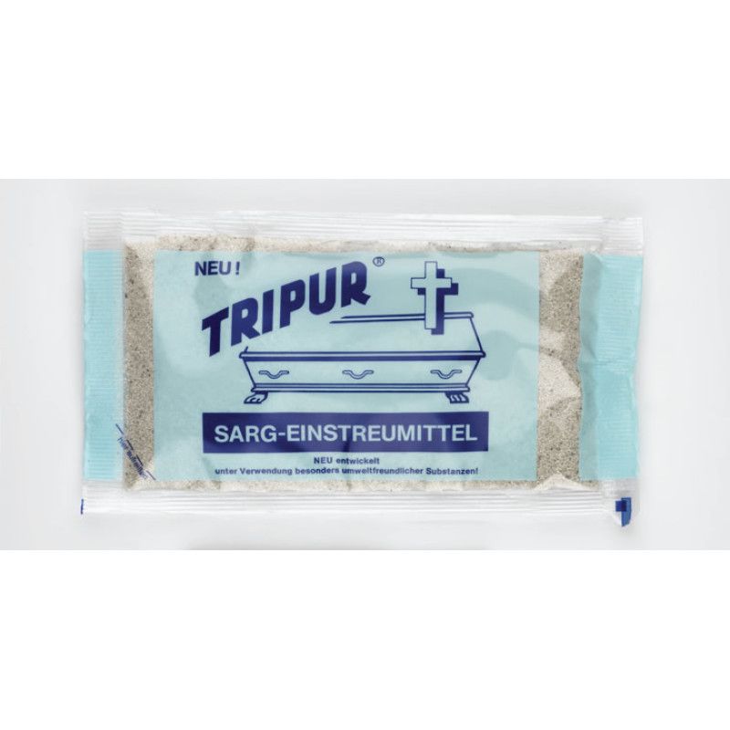 Das Produktfoto zeigt eine Verpackung des Sarg-Einstreumittels "Tripur" in einer blauen Tüte mit einer Abbildung eines Sarges und einem Kreuz.