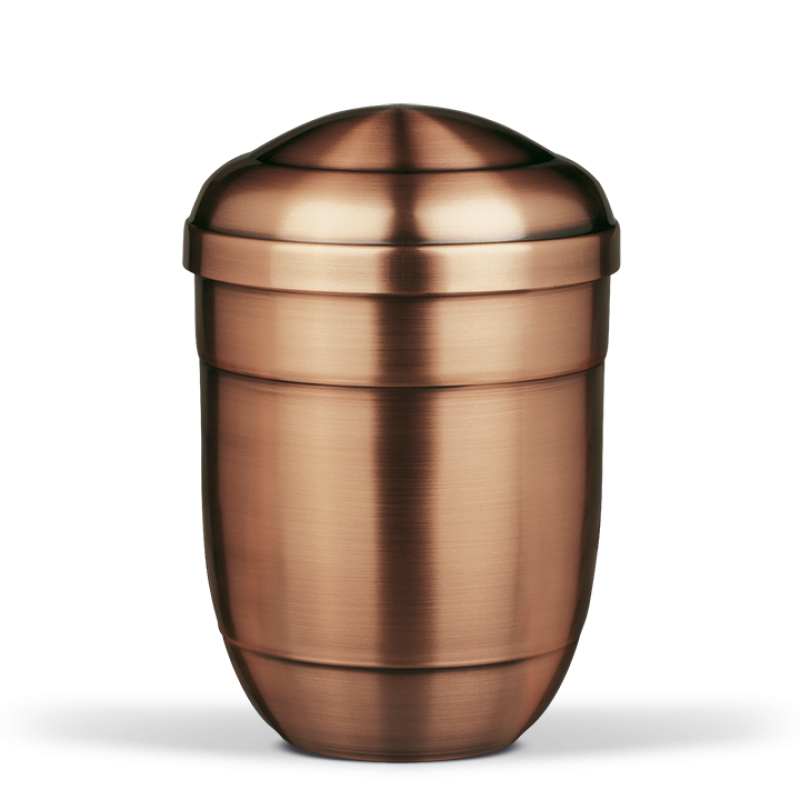Eine bronzefarbene Testurne aus Metall mit einer runden Form und einem gewölbten Deckel, in Gesamtansicht dargestellt.