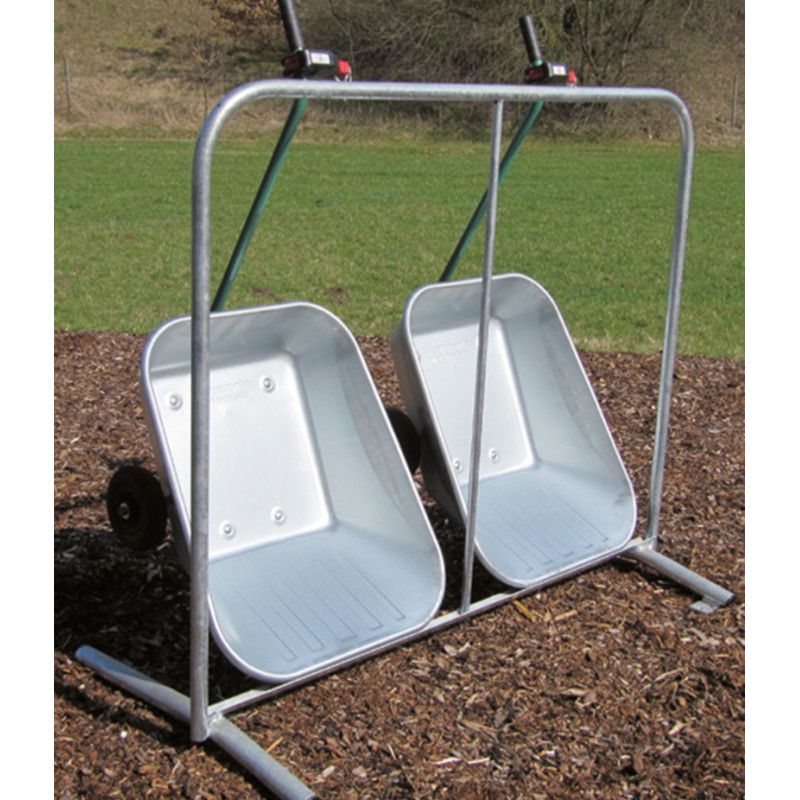 Die Pfandstation besteht aus einem stabilen Metallrahmen mit zwei silbernen Wannen, die auf einem Untergestell montiert sind und über Rollen verfügen.