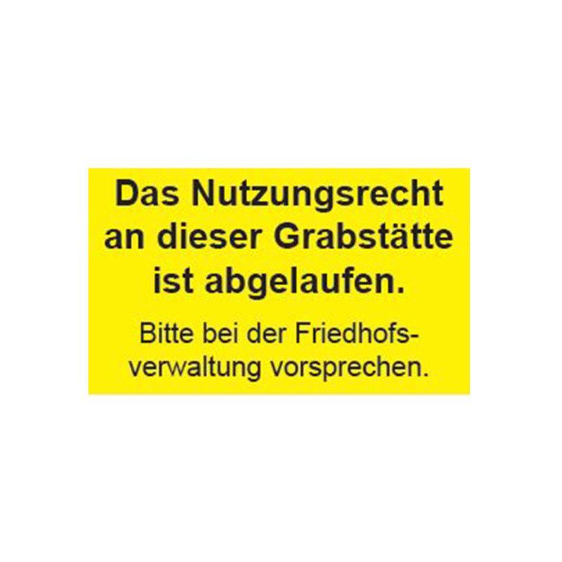 Hinweisschild in leuchtendem Gelb mit schwarzer Schrift, das den Text "Das Nutzungsrecht an dieser Grabstätte ist abgelaufen. Bitte bei der Friedhofsverwaltung vorsprechen." enthält.
