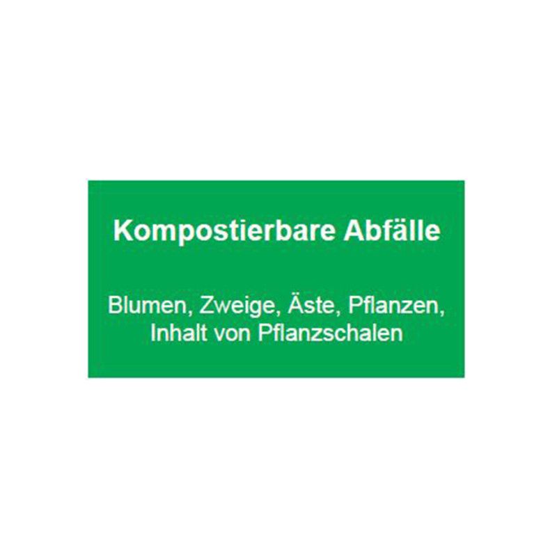 Ein rechteckiges, grünes Schild mit weißer Schrift, das auf kompostierbare Abfälle hinweist, einschließlich Blumen, Zweigen, Ästen und Pflanzen.